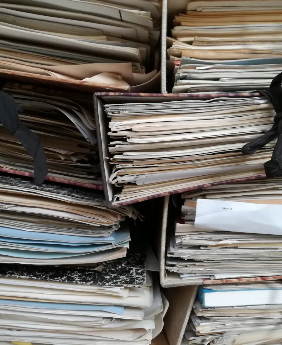 Bundles of notes and papers tied with string